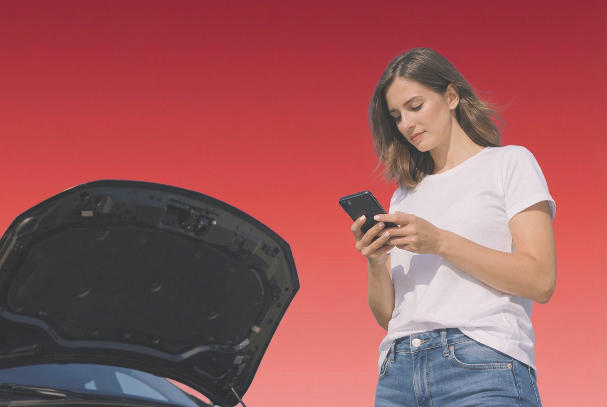 Couple utilisant un smartphone dans une voiture